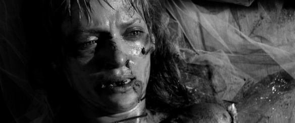 Uma Thurman's "Bride" starts out bloodied, beaten and objectified at the beginning of KILL BILL, VOL. 1 (2003).